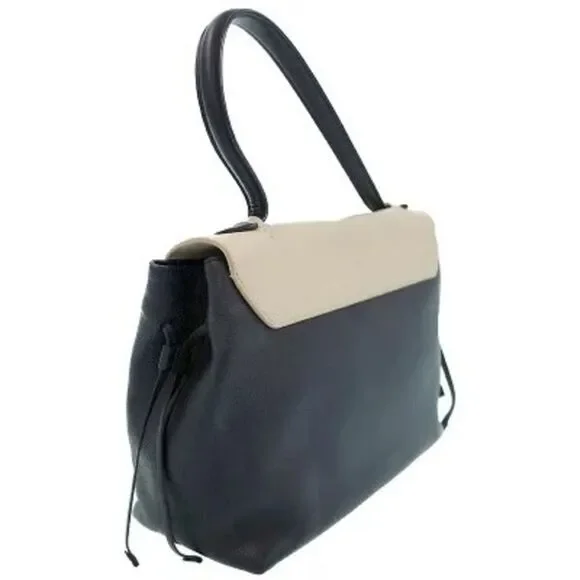 Louis Vuitton Lock Me MM Handbag - Picture 5 of 9